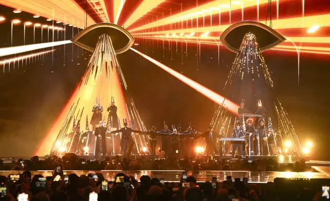 Neil Tennant, left, and Chris Lowe from the 'Pet Shop Boys' perform alongside the Manchester Camerata during the MTV European Music Awards in Manchester, England, Sunday, Nov. 10, 2024. (Scott A Garfitt/Invision/AP)