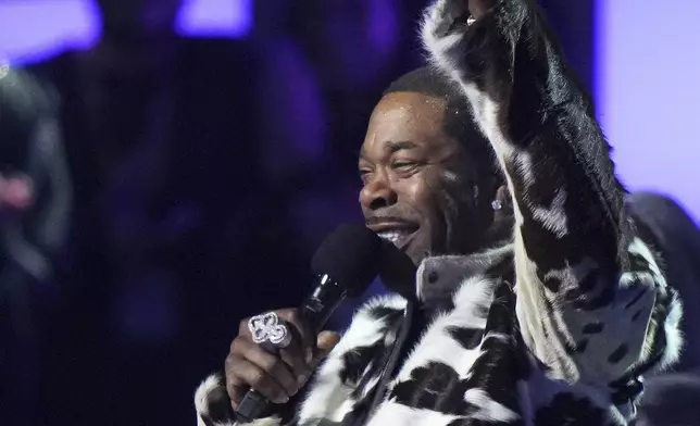 Busta Rhymes holds the 2024 MTV EMAs global icon award during the MTV European Music Awards in Manchester, England, Sunday, Nov. 10, 2024. (Scott A Garfitt/Invision/AP)