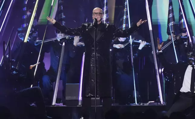 Neil Tennant from the 'Pet Shop Boys' performs alongside the Manchester Camerata during the MTV European Music Awards in Manchester, England, Sunday, Nov. 10, 2024. (Scott A Garfitt/Invision/AP)