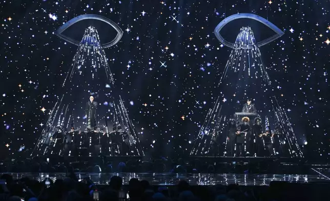 Neil Tennant, left, and Chris Lowe from the 'Pet Shop Boys' perform alongside the Manchester Camerata during the MTV European Music Awards in Manchester, England, Sunday, Nov. 10, 2024. (Scott A Garfitt/Invision/AP)