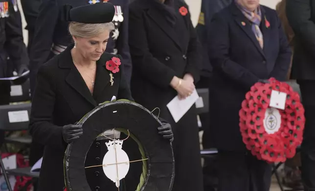 Sophie, Duchess of Edinburgh, lays a wreath during the Remembrance service at National Memorial Arboretum in Alrewas, Staffordshire, England, to mark Armistice Day, Monday Nov. 11, 2024. (Jacob King/PA via AP)