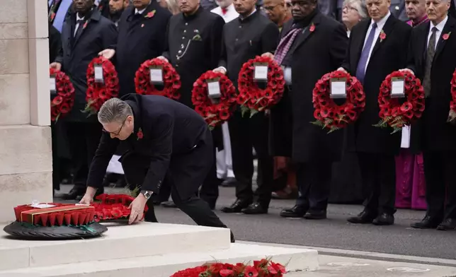 Britain's Prime Minister Keir Starmer lays a wreath during the Remembrance Sunday Service at the Cenotaph in London, Sunday, Nov. 10, 2024. (AP Photo/Alberto Pezzali)