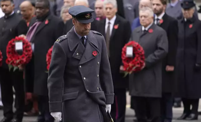 Britain's Prince William returns to his position after laying a wreath during the Remembrance Sunday Service at the Cenotaph in London, Sunday, Nov. 10, 2024. (AP Photo/Alberto Pezzali, Pool)