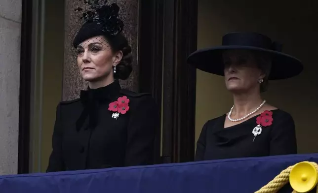 Kate, Princess of Wales, left an Sophie, Duchess of Edinburgh attend the Remembrance Sunday service at the Cenotaph in London, Sunday, Nov. 10, 2024. (AP Photo/Alberto Pezzali, Pool )