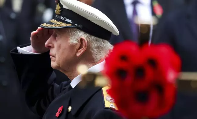 Britain's King Charles attends the Remembrance Sunday ceremony at The Cenotaph in London, England, Sunday, Nov. 10, 2024. (Toby Melville/Pool Photo via AP)