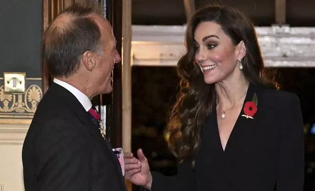 Britain's Catherine, Princess of Wales, attends the Royal British Legion Festival of Remembrance at the Royal Albert Hall in London, Saturday Nov. 9, 2024. (Chris J. Ratcliffe/Pool Photo via AP)