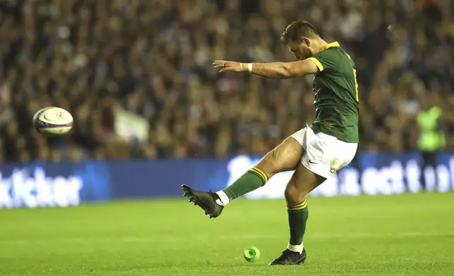 South Africa's Handre Pollard kicks a penalty goal during the Autumn Nations series rugby union match between Scotland and South Africa in Edinburgh, Scotland, Sunday, Nov. 10, 2024. (AP Photo/Scott Heppell)