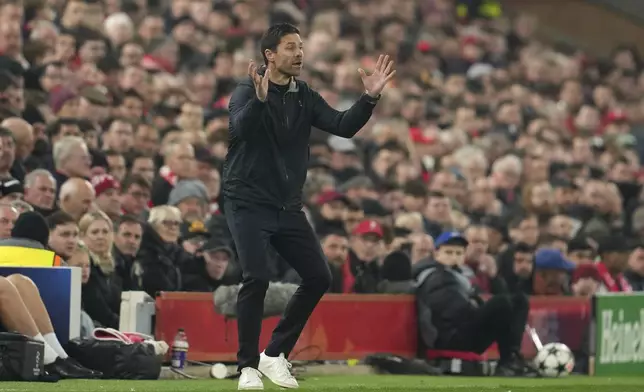 Leverkusen's head coach Xabi Alonso gestures from the touchline during the Champions League opening phase soccer match between Liverpool and Bayer Leverkusen at Anfield in Liverpool, England, Tuesday, Nov. 5, 2024. (AP Photo/Jon Super)