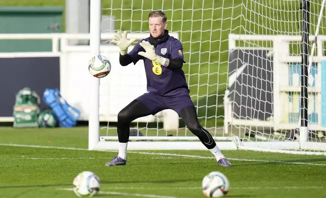 England goalkeeper Jordan Pickford practices during a training session at St George's Park, Burton upon Trent, England, Wednesday Nov. 13, 2024. (Nick Potts/PA via AP)