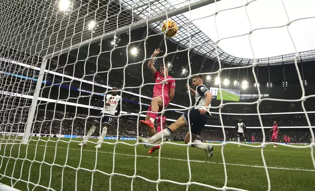 Ipswich Town's Liam Delap, centre, scores their side's second goal of the game during the Premier League match between Tottenham and Ipswich at Tottenham Hotspur stadium, London, Sunday Nov. 10, 2024. (Steven Paston/PA via AP)