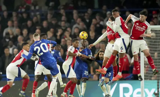 Chelsea's Cole Palmer takes a free kick during the English Premier League soccer match between Chelsea and Arsenal at Stamford Bridge stadium in London, Sunday, Nov. 10, 2021. (AP Photo/Kirsty Wigglesworth)