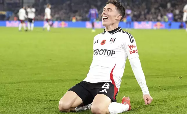 Fulham's Harry Wilson celebrates scoring their side's second goal of the game during the Premier League match at Selhurst Park, London, Saturday Nov. 9, 2024. (Zac Goodwin/PA via AP)