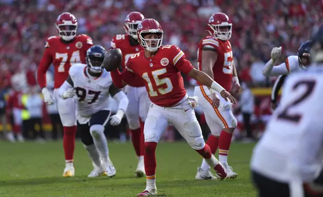 Kansas City Chiefs quarterback Patrick Mahomes (15) throws during the second half of an NFL football game against the Denver Broncos Sunday, Nov. 10, 2024, in Kansas City, Mo. (AP Photo/Charlie Riedel)