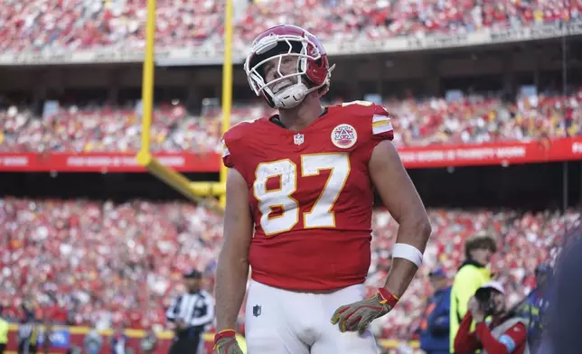 Kansas City Chiefs tight end Travis Kelce reacts after being overthrown in the end zone during the second half of an NFL football game against the Denver Broncos Sunday, Nov. 10, 2024, in Kansas City, Mo. (AP Photo/Ed Zurga)