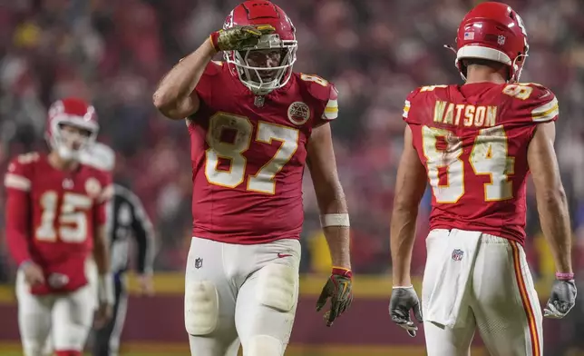 Kansas City Chiefs tight end Travis Kelce (87) celebrates a first down reception against the Tampa Bay Buccaneers during overtime of an NFL football game, Monday, Nov. 4, 2024, in Kansas City, Mo. (AP Photo/Ed Zurga)