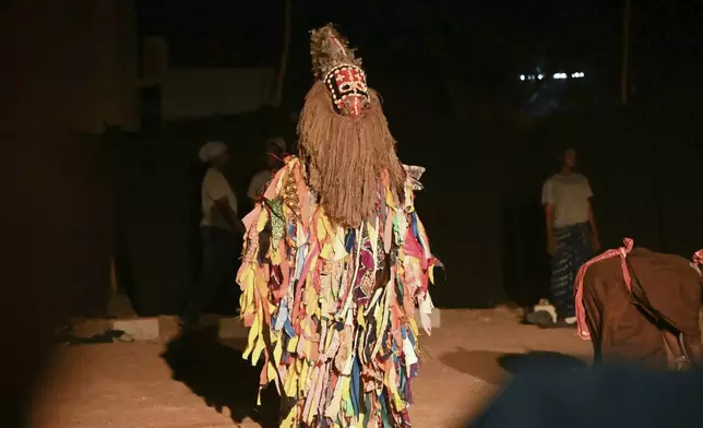 An actor participates in Recreatrales, an international theater festival held in Ouagadougou, Burkina Faso, Monday, Oct. 28, 2024. (AP Photo/Kilaye Bationo)