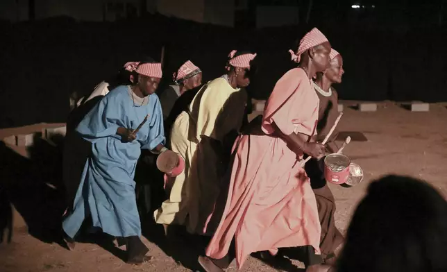 Actors participate in Recreatrales, an international theater festival held in Ouagadougou, Burkina Faso, Monday, Oct. 28, 2024. (AP Photo/Kilaye Bationo)