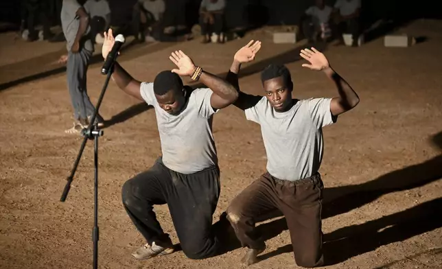 Actors participate in Recreatrales, an international theater festival held in Ouagadougou, Burkina Faso, Monday, Oct. 28, 2024. (AP Photo/Kilaye Bationo)