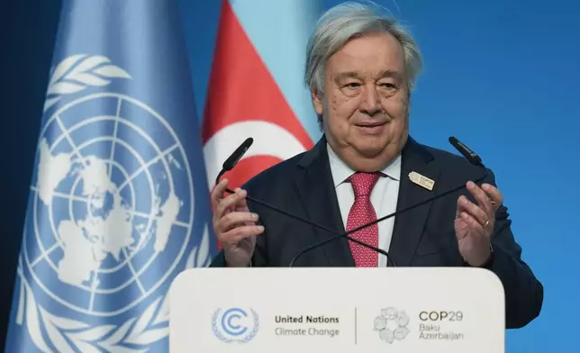 Antonio Guterres, United Nations secretary-general, speaks during a plenary session at the COP29 U.N. Climate Summit, Tuesday, Nov. 12, 2024, in Baku, Azerbaijan. (AP Photo/Rafiq Maqbool)