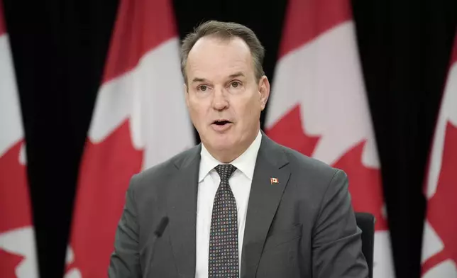 Canada Labour Minister Steven MacKinnon speaks with media during a news conference, Tuesday, Nov. 12, 2024, in Ottawa. (Adrian Wyld/The Canadian Press via AP)