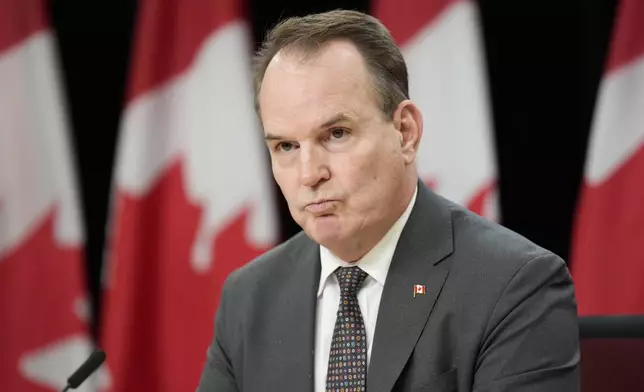 Canada Labour Minister Steven MacKinnon speaks with media during a news conference, Tuesday, Nov. 12, 2024 in Ottawa. (Adrian Wyld/The Canadian Press via AP)