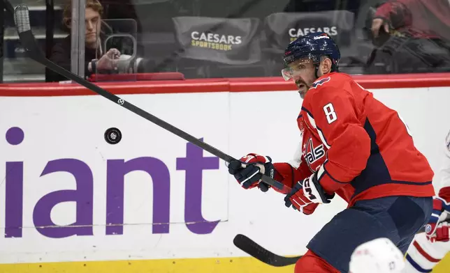 Washington Capitals left wing Alex Ovechkin (8) watches the puck during the third period of an NHL hockey game against the Montreal Canadiens, Thursday, Oct. 31, 2024, in Washington. The Capitals won 6-3. (AP Photo/Nick Wass)