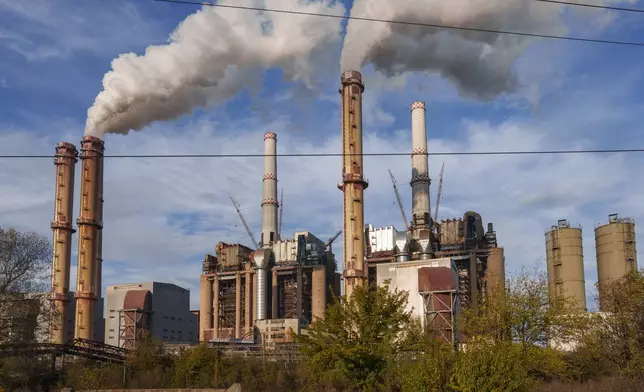 Rovinari, a plant that produces electricity from coal, operates in Rovinari, southern Romania, Friday, Oct. 11, 2024. (AP Photo/Vadim Ghirda)