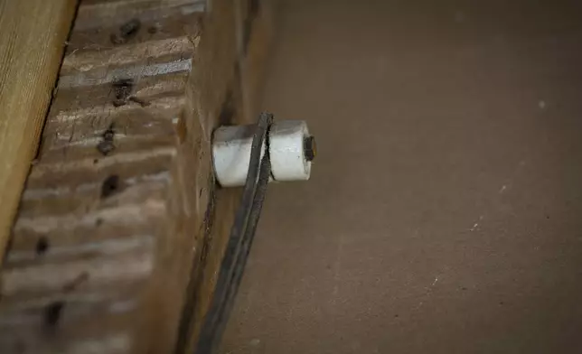 Knob and tube electrical wiring at the Bray School on Wednesday, Oct 30, 2024 in Williamsburg, Va. (AP Photo/John C. Clark)