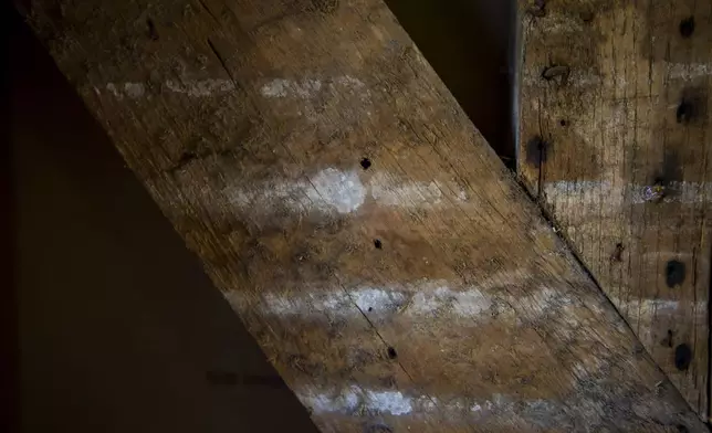 Residue from the original plaster walls of the Williamsburg Bray School on Wednesday, Oct 30, 2024 in Williamsburg, Va. (AP Photo/John C. Clark)