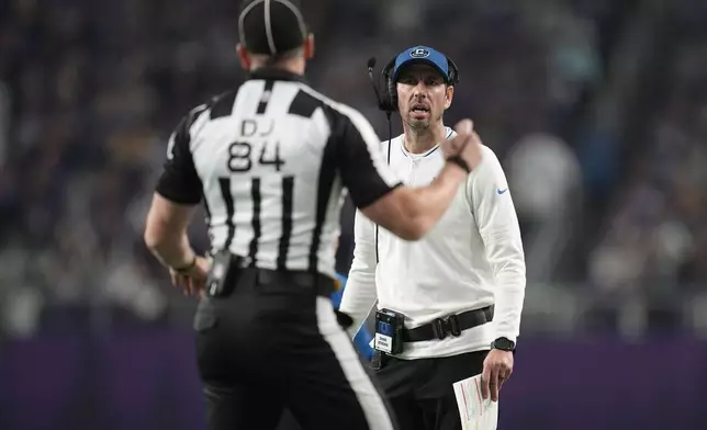 Indianapolis Colts head coach Shane Steichen questions a call during the first half of an NFL football game against the Minnesota Vikings, Sunday, Nov. 3, 2024, in Minneapolis. (AP Photo/Abbie Parr)