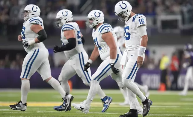 Indianapolis Colts quarterback Joe Flacco (15) walks off the field after throwing an incomplete pass during the first half of an NFL football game against the Minnesota Vikings, Sunday, Nov. 3, 2024, in Minneapolis. (AP Photo/Abbie Parr)