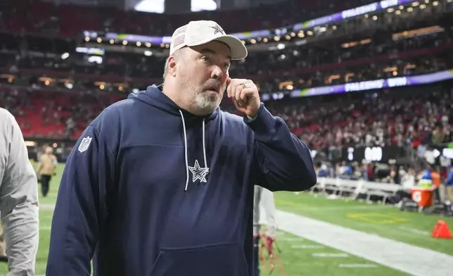 Dallas Cowboys head coach Mike McCarthy walks off the field after an NFL football game against the Atlanta Falcons, Sunday, Nov. 3, 2024, in Atlanta. The Falcons won 27-21. (AP Photo/ Brynn Anderson)