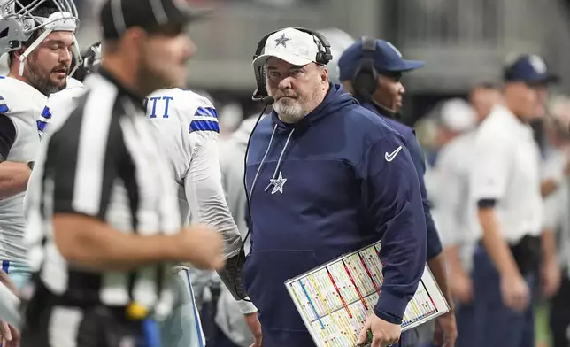 Dallas Cowboys head coach Mike McCarthy walks on the sideline during the second half of an NFL football game against the Atlanta Falcons, Sunday, Nov. 3, 2024, in Atlanta. (AP Photo/ Brynn Anderson)