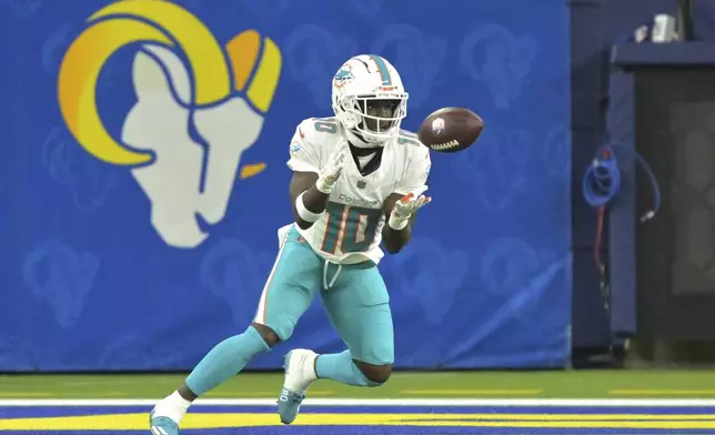 Miami Dolphins wide receiver Tyreek Hill makes a catch for a touchdown during the second half of an NFL football game against the Los Angeles Rams, Monday, Nov. 11, 2024, in Inglewood, Calif. (AP Photo/Jayne Kamin-Oncea)