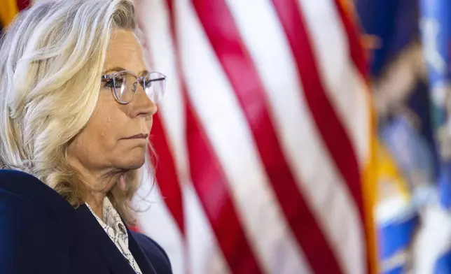 Former Rep. Liz Cheney listens in as U.S. Rep. Elissa Slotkin, D- Holly speaks during a campaign event at New Vintage Place in Grand Rapids, Mich. on Monday, Oct. 28, 2024. Slotkin is battling republican candidate Mike Rogers for the seat of Democratic Sen. Debbie Stabenow, who is retiring. (Joel Bissell/Kalamazoo Gazette via AP)