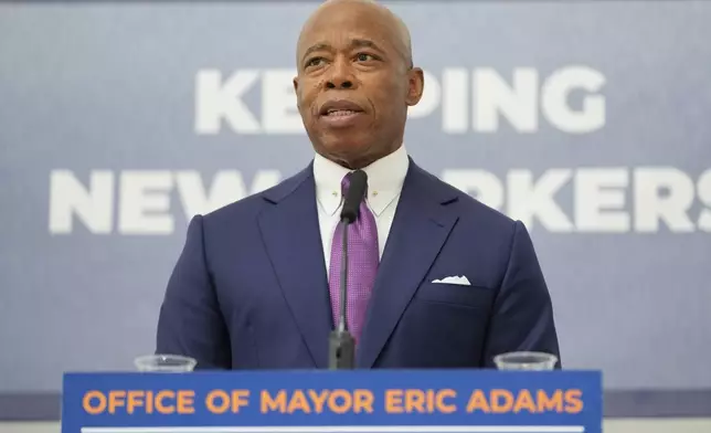 FILE - New York City Mayor Eric Adams speaks to reporters after a news conference in New York, Monday, Sept. 30, 2024. (AP Photo/Seth Wenig, File)