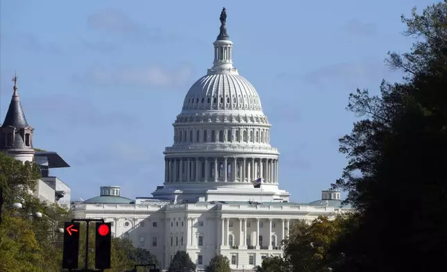 The U.S. Capitol is seen from Pennsylvania Avenue in Washington, on Election Day, Tuesday, Nov. 5, 2024. (AP Photo/Jon Elswick)