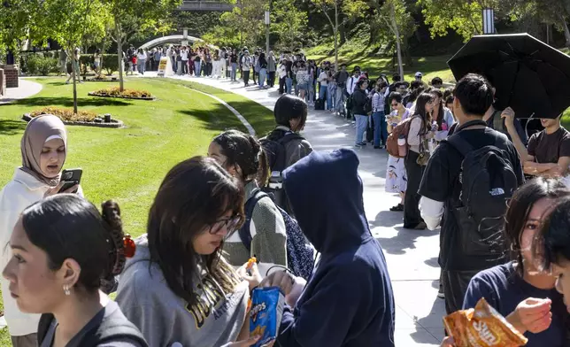 Students wait in line to vote at the student center at the University of California, Irvine on Election Day in Irvine, Calif., Tuesday, Nov. 5, 2024. (Paul Bersebach/The Orange County Register via AP)