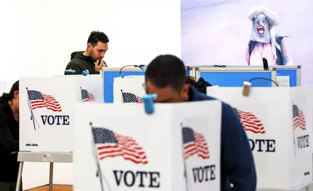 Sidney Golden casts his ballot at the Triton Museum of Art in Santa Clara, Calif., on Tuesday, Nov. 5, 2024. (AP Photo/Noah Berger)