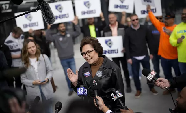 Senator Jacky Rosen, D-Nev., speaks to members of the media after voting at the Allegiant Stadium polling place, Tuesday, Nov. 5, 2024, in Las Vegas. (AP Photo/John Locher)