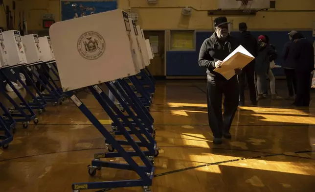 Voters cast their ballots at the P.S. 256 in the Brooklyn borough of New York on Election Day, Tuesday, Nov. 5, 2024. (AP Photo/Yuki Iwamura)