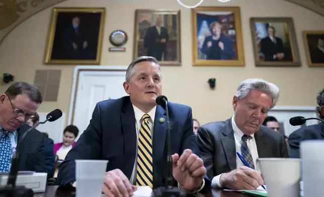 FILE - Rep. Bruce Westerman, R-Ark., center, chairman of the House Committee on Natural Resources, delivers remarks at the Capitol in Washington, March 27, 2023. (AP Photo/J. Scott Applewhite, File)