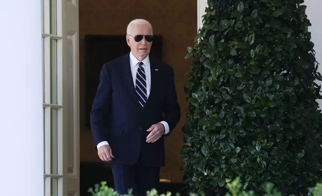 President Joe Biden walks out of the Oval Office to speak in the Rose Garden of the White House in Washington, Thursday, Nov. 7, 2024. (AP Photo/Susan Walsh)