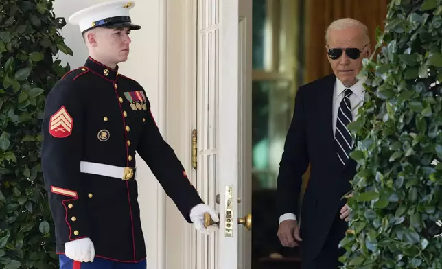 President Joe Biden arrives to speak in the Rose Garden of the White House in Washington, Thursday, Nov. 7, 2024. (AP Photo/Ben Curtis)