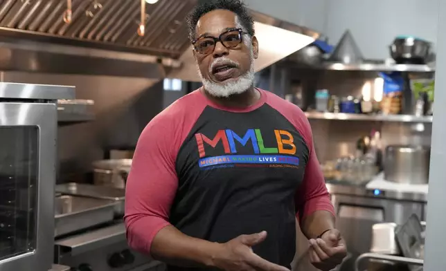 Small business owner Michael Hooks stands in the kitchen of his catering business in Erie, Pa. Friday, Nov. 1, 2024. (AP Photo/Gene J. Puskar)