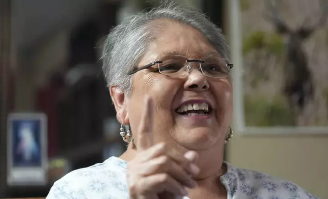 Democrat Nelda Cruz Gonzalez talks about voting for Republican Donald Trump for president, Wednesday, Nov. 6, 2024, in Rio Grande City, Texas. (AP Photo/Eric Gay)