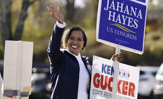 U.S. Rep. Jahana Hayes, D-Conn., waves to voters on Election Day, Tuesday, Nov. 5, 2024, in Danbury, Conn. (Jessica Hill/Hartford Courant via AP)