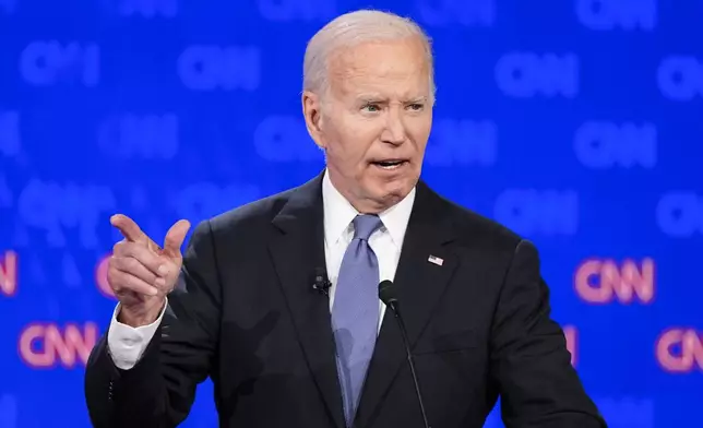 President Joe Biden gestures during a presidential debate with Republican presidential candidate former President Donald Trump, Thursday, June 27, 2024, in Atlanta. (AP Photo/Gerald Herbert)