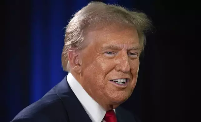 Republican presidential nominee former President Donald Trump speaks to reporters in the spin room after a presidential debate with Democratic presidential nominee Vice President Kamala Harris, Tuesday, Sept. 10, 2024, in Philadelphia. (AP Photo/Matt Slocum)