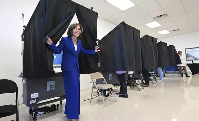 Rep. Lisa Blunt Rochester, D-Del, votes during early voting, Sunday, Nov. 3, 2024, in Wilmington, Del. (AP Photo/Gail Burton)